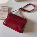 https://cdn.shopifycdn.net/s/files/1/0587/4132/5898/files/Retro-Patent-Leather-Shoulder-Bag-For-Women-Luxury-Flap-Crossbody-Bag-Solid-Color-Underarm-Bag-Red.jpg__1.webp?v=1710943863