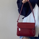 https://cdn.shopifycdn.net/s/files/1/0587/4132/5898/files/Retro-Patent-Leather-Shoulder-Bag-For-Women-Luxury-Flap-Crossbody-Bag-Solid-Color-Underarm-Bag-Red.jpg_640x640.jpg__1.jpg?v=1710943901