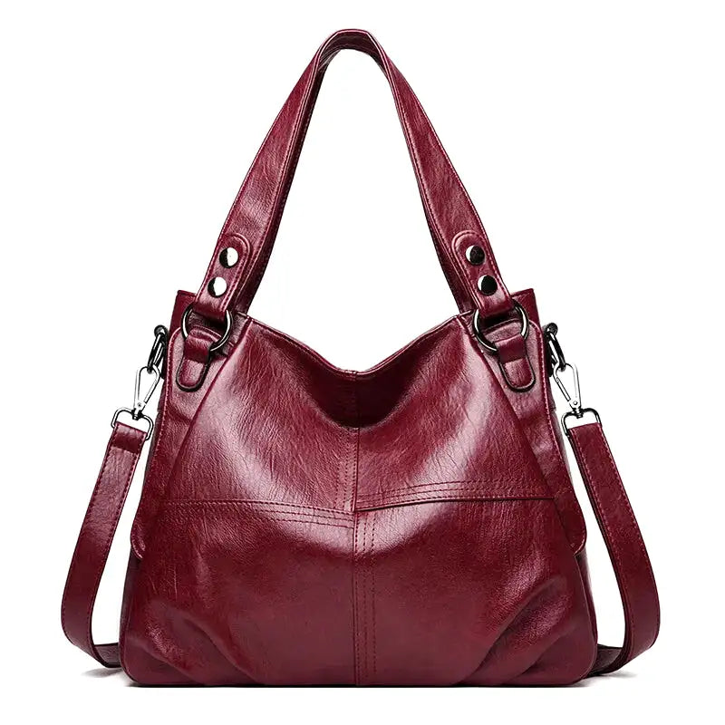 https://cdn.shopifycdn.net/s/files/1/0912/2526/0407/files/leonor-sac-a-main-de-cours-en-cuir-a-bandouliere-rouge-sac-a-main-5.webp?v=1742898093