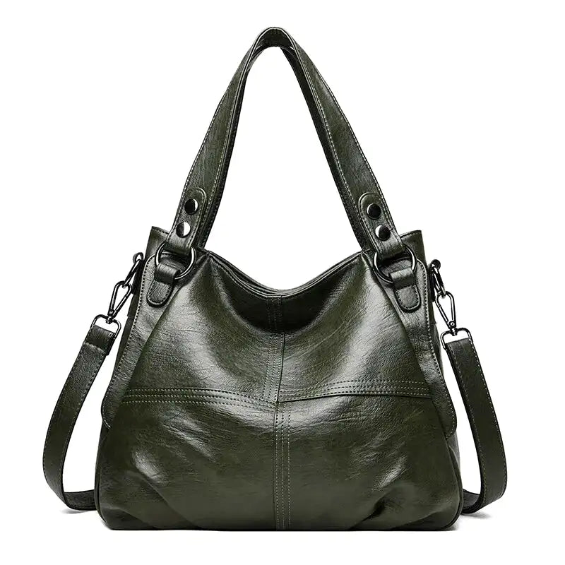 https://cdn.shopifycdn.net/s/files/1/0912/2526/0407/files/leonor-sac-a-main-de-cours-en-cuir-a-bandouliere-vert-sac-a-main-4.webp?v=1742898093