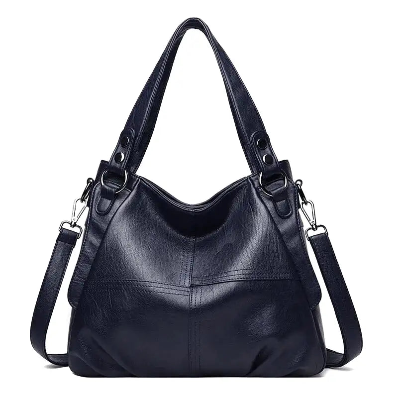 https://cdn.shopifycdn.net/s/files/1/0912/2526/0407/files/leonor-sac-a-main-de-cours-en-cuir-a-bandouliere-bleu-fonce-sac-a-main-3.webp?v=1742898093