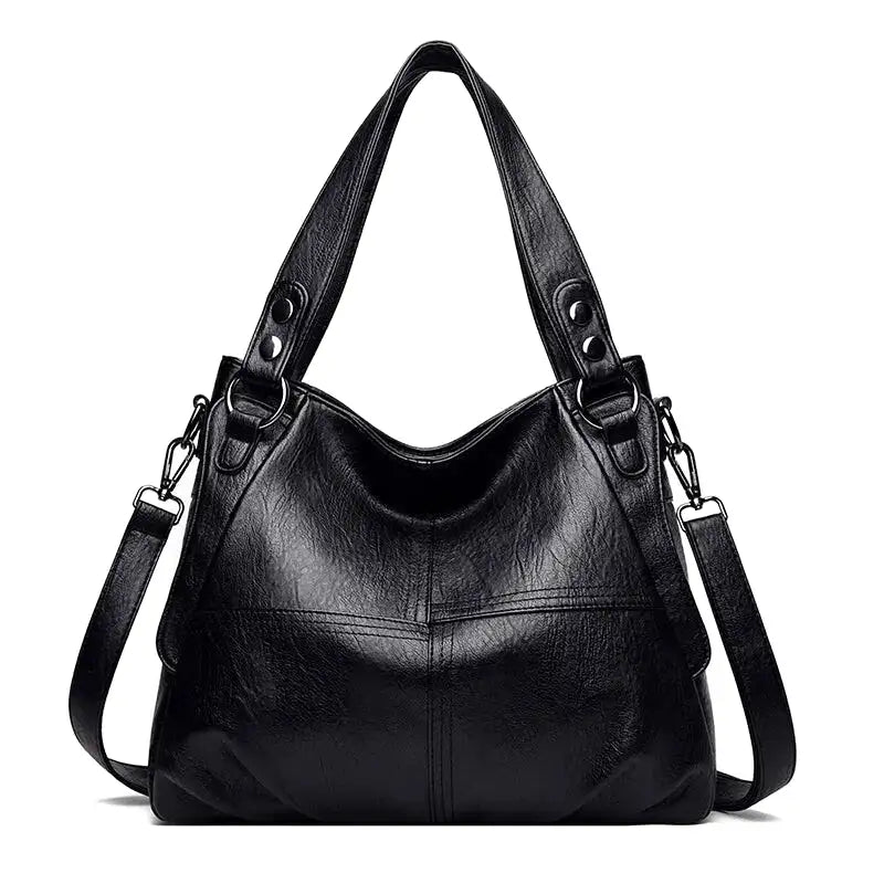 https://cdn.shopifycdn.net/s/files/1/0912/2526/0407/files/leonor-sac-a-main-de-cours-en-cuir-a-bandouliere-noir-sac-a-main-2.webp?v=1742898093