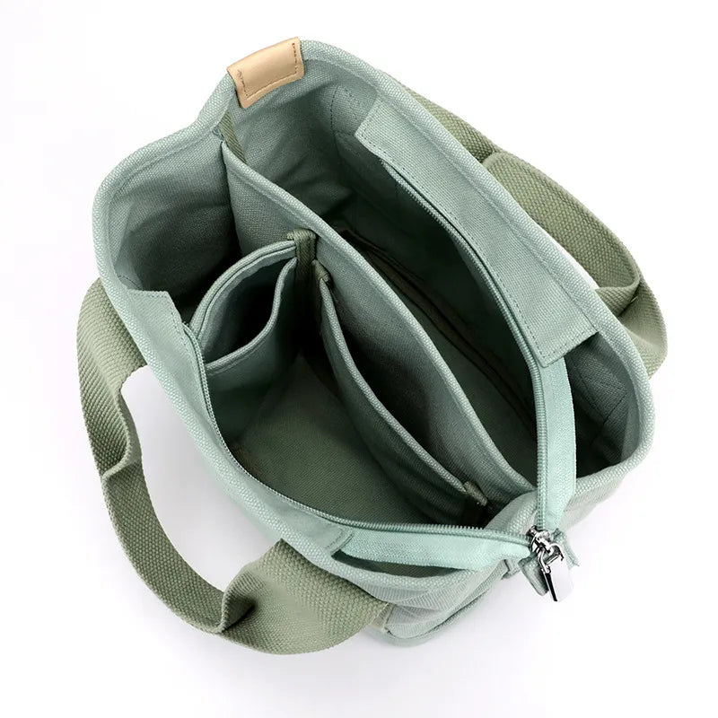 https://cdn.shopifycdn.net/s/files/1/0912/2526/0407/files/Xierya-Vrouwen-Kleine-Tas-Met-Rits-Mode-Dame-Enkele-Schouder-Draagbare-Verdikte-Canvas-Mobiele-Telefoon-Emmer_jpg.webp?v=1742898103