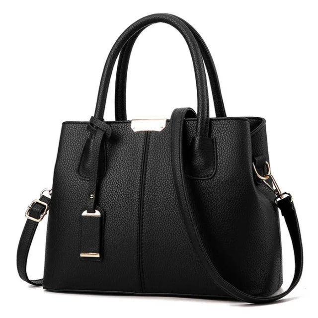 https://cdn.shopifycdn.net/s/files/1/0752/7143/8651/files/Famous-Designer-Brand-Bags-Women-Leather-Handbags-New-Luxury-Ladies-Hand-Bags-Purse-Fashion-Shoulder-Bags_66d2b708-fc18-4385-b865-6b247221bdb7.webp?v=1739323176