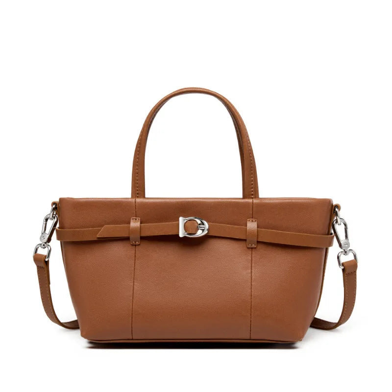 https://cdn.shopifycdn.net/s/files/1/0752/7143/8651/files/YANATARI-Genuine-leather-woman-bag-shoulder-bag-Handbags-ladies-crossbody-bags-luxury-designer-minimalism-bag-Cattle.webp?v=1739282200