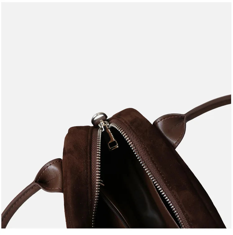 https://cdn.shopifycdn.net/s/files/1/0752/7143/8651/files/2024-Fashionable-Suede-Women-Bag-Retro-Frosted-Real-Leather-Armpit-Shoulder-Bag-Lady-Red-Handbag-Trendy_72f4717d-571c-433a-8d6e-282b5ada579f.webp?v=1739282187