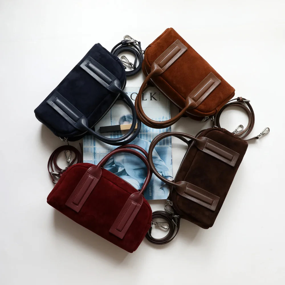 https://cdn.shopifycdn.net/s/files/1/0752/7143/8651/files/2024-Fashionable-Suede-Women-Bag-Retro-Frosted-Real-Leather-Armpit-Shoulder-Bag-Lady-Red-Handbag-Trendy_6ce9dda5-7be1-44ed-b31a-459cfc3a0404.webp?v=1739282187