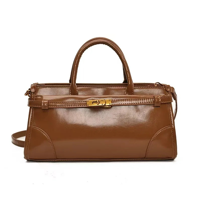 https://cdn.shopifycdn.net/s/files/1/0752/7143/8651/files/High-End-Burgundy-Briefcase-Ladies-Zipper-Large-Capacity-Underarm-Bag-Elegant-Retro-Women-s-Commuting-Handbag_1ee81bae-49b8-43cc-aae7-7916ecf4fdf1.webp?v=1739266835