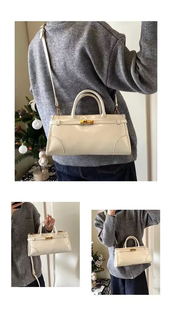 https://cdn.shopifycdn.net/s/files/1/0752/7143/8651/files/High-End-Burgundy-Briefcase-Ladies-Zipper-Large-Capacity-Underarm-Bag-Elegant-Retro-Women-s-Commuting-Handbag_2a847ca9-23f9-493c-884d-25e148a538c8.webp?v=1739266834
