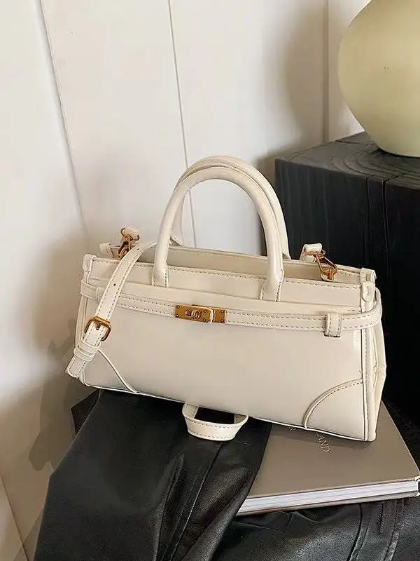 https://cdn.shopifycdn.net/s/files/1/0752/7143/8651/files/High-End-Burgundy-Briefcase-Ladies-Zipper-Large-Capacity-Underarm-Bag-Elegant-Retro-Women-s-Commuting-Handbag_bc405b06-dacc-4ba6-95d9-fce6887164b2.webp?v=1739266834