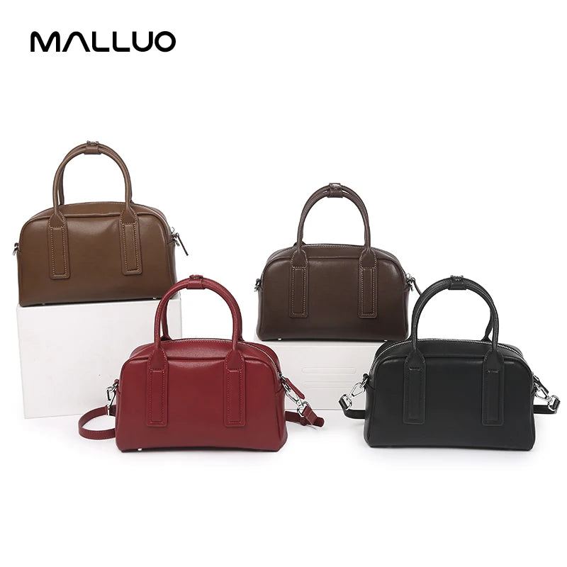 https://cdn.shopifycdn.net/s/files/1/0752/7143/8651/files/Women-s-Cowhide-Genuine-Leather-Shoulder-Bag-Ladies-Soft-Cow-Real-Leather-Handbag-Female-Fashion-Luxury.webp?v=1739266815