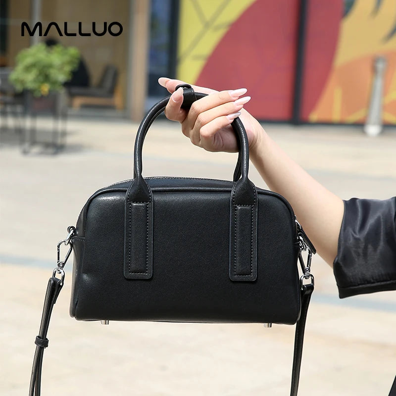 https://cdn.shopifycdn.net/s/files/1/0752/7143/8651/files/Women-s-Cowhide-Genuine-Leather-Shoulder-Bag-Ladies-Soft-Cow-Real-Leather-Handbag-Female-Fashion-Luxury_ce801682-8ceb-44fc-80c6-10659bddd51b.webp?v=1739266815