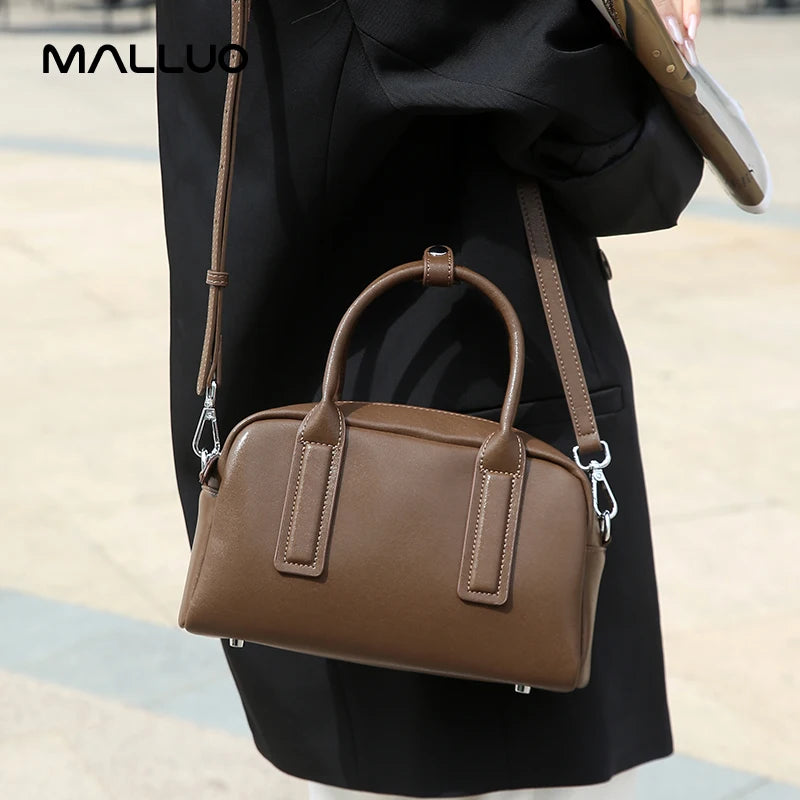 https://cdn.shopifycdn.net/s/files/1/0752/7143/8651/files/Women-s-Cowhide-Genuine-Leather-Shoulder-Bag-Ladies-Soft-Cow-Real-Leather-Handbag-Female-Fashion-Luxury_35e61646-37c2-4806-aadf-a79ab1b9d517.webp?v=1739266815