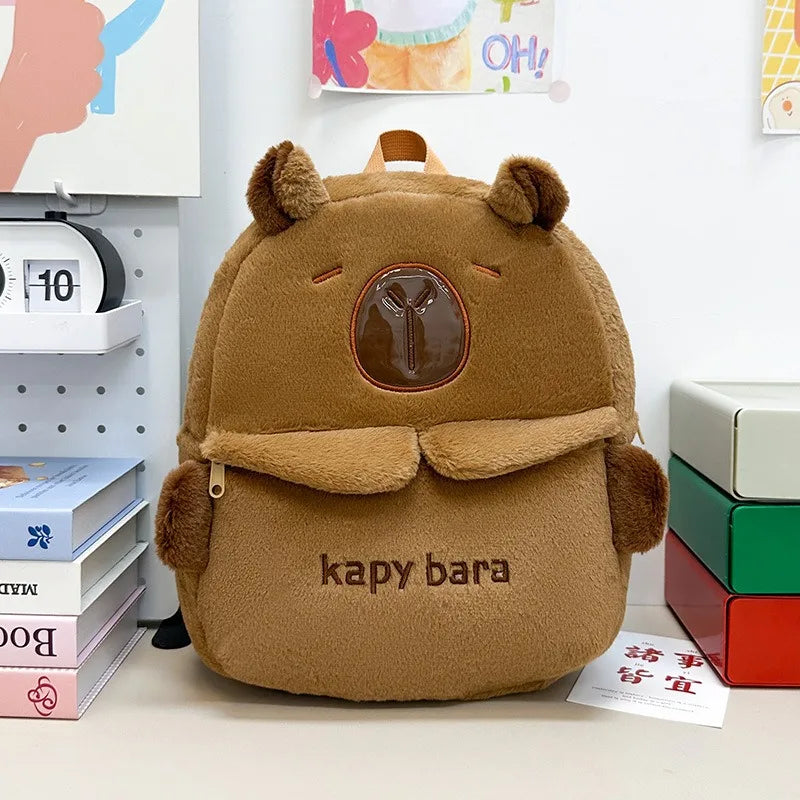 https://cdn.shopifycdn.net/s/files/1/0752/7143/8651/files/Kawaii-Capybara-Plush-Backpack-for-Women-Versatile-Cartoon-Funny-Capibala-Crossbody-Bag-aLrge-Capacity-Tote-Bag_1b75d418-6bd8-43bd-a12b-cae8b8929114.webp?v=1738829404