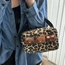 https://cdn.shopifycdn.net/s/files/1/0752/7143/8651/files/Hellokitty-Leopard-Cosmetic-Bag-Sanrio-Kawaii-Fashion-Cartoon-Handbag-Large-Capacity-Makeup-Case-Portable-Satchel-Backpacks.webp?v=1738829384