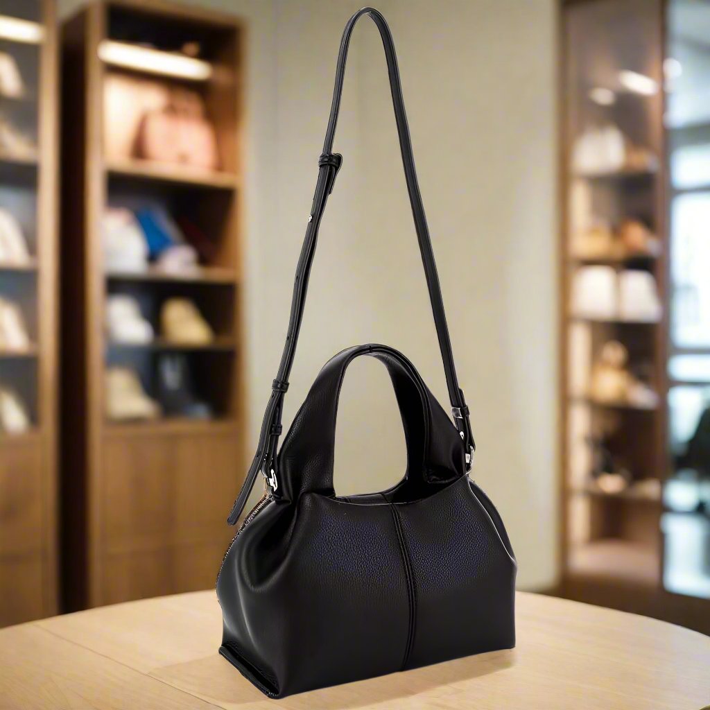 https://cdn.shopifycdn.net/s/files/1/0895/7945/4737/files/RUBY_STYLISH_HANDBAG-2.jpg?v=1731003572