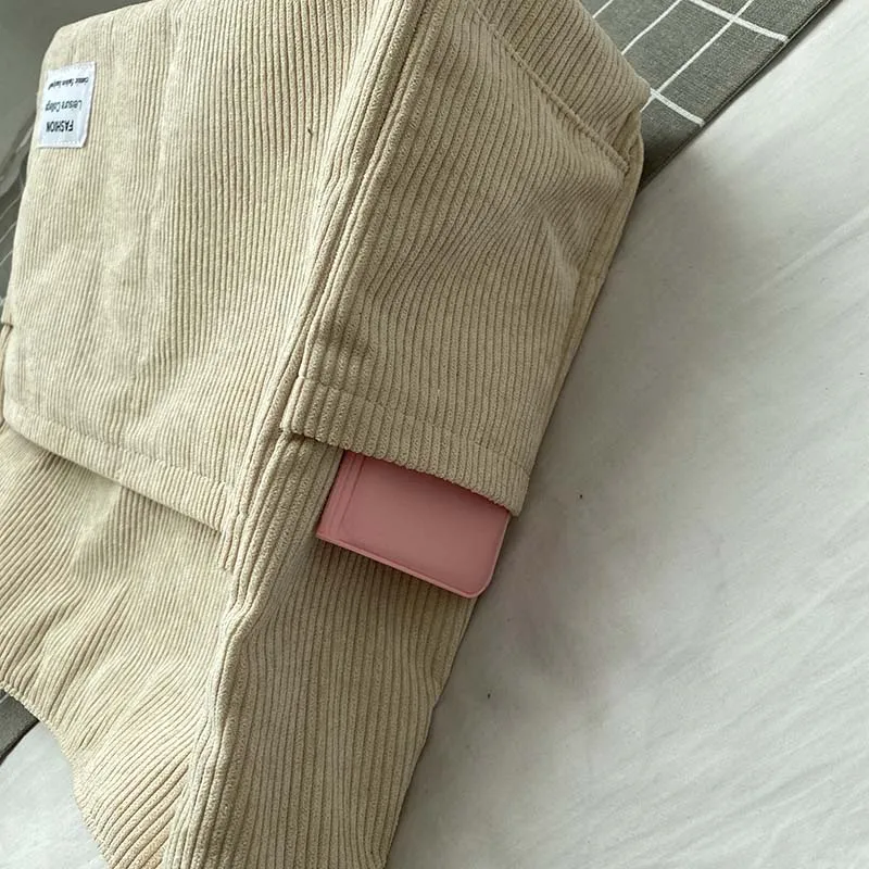 https://ae01.alicdn.com/kf/Saf1332425b1040e3a01c2942bdc01deeV/Cord-Tote-Tasche-2023-Fashion-Leisure-College-Style-Original-Brand-Frauen-Mode-Schulter-Tasche-Weibliche-Shopper.jpg