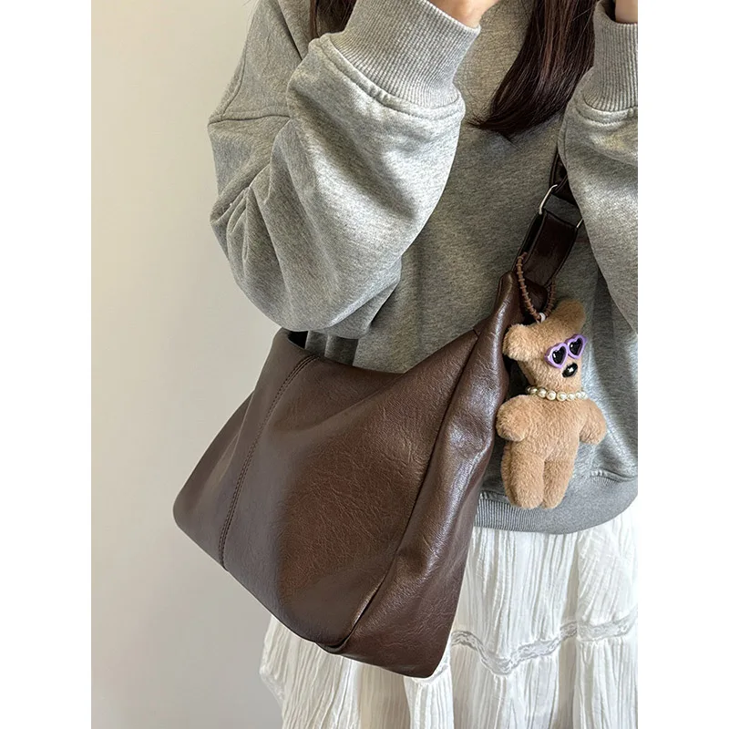 https://ae01.alicdn.com/kf/Sd04c1023d61b41e3a5564a65d417710bp/Damen-tasche-neue-Herbst-und-Winter-vielseitig-ins-Retro-Einkaufstasche-adrette-l-ssige-gro-e-kapazitive.jpg