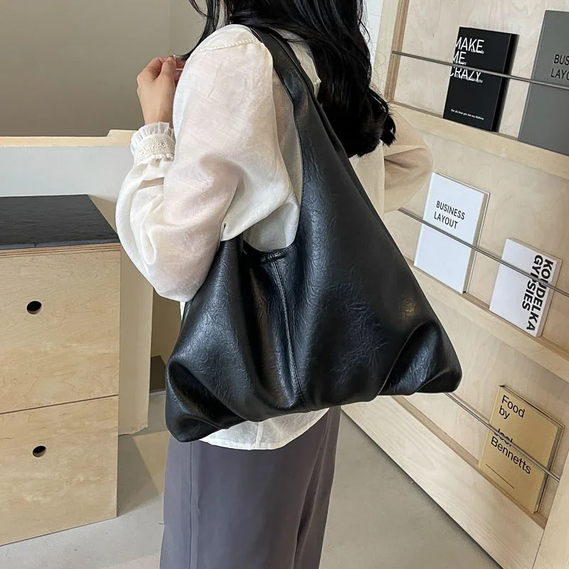 https://ae01.alicdn.com/kf/S75e80418c9ac436b83ab554012c7355f3/2024-neue-2-Set-Tote-Damen-Tasche-gro-e-Kapazit-t-Umh-ngetaschen-schwarze-weiche-Leder.jpg