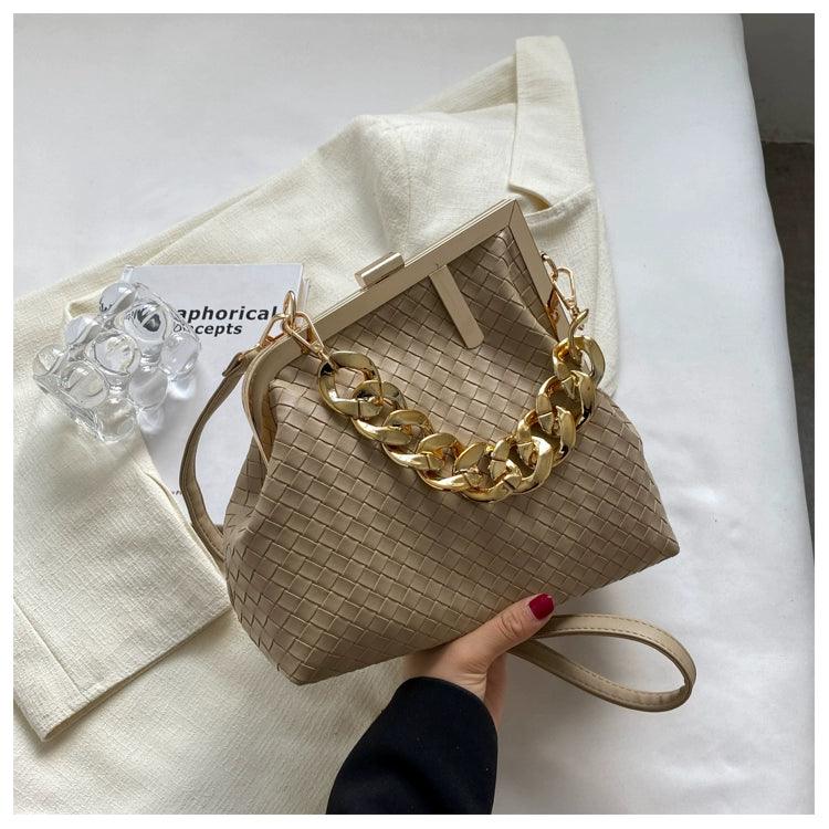 https://cdn.shopifycdn.net/s/files/1/0669/3876/5628/files/Carauana-UNIU-SILVER-GOLD-Knitted-Crossbody-Bag-Fashion-Satchel-NEW-2024-Collection-48.webp?v=1729464514