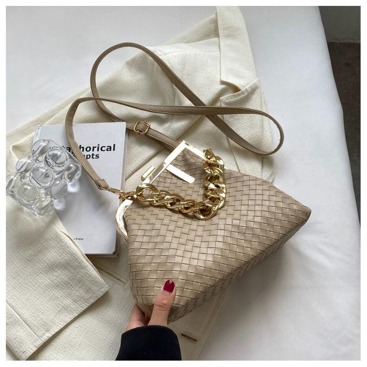 https://cdn.shopifycdn.net/s/files/1/0669/3876/5628/files/Carauana-UNIU-SILVER-GOLD-Knitted-Crossbody-Bag-Fashion-Satchel-NEW-2024-Collection-47.webp?v=1729464511
