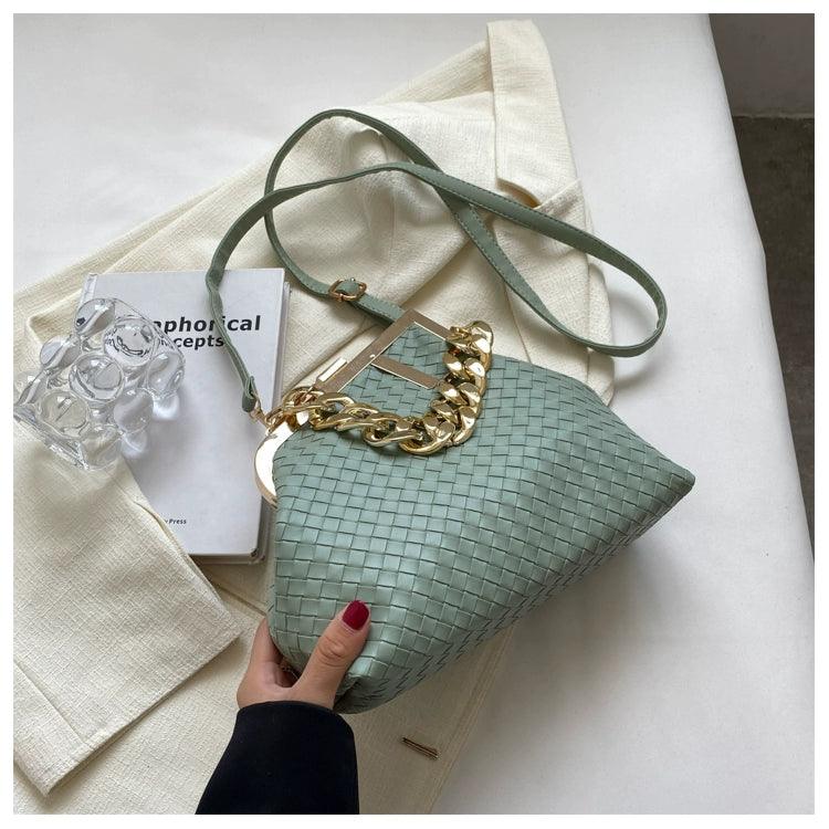 https://cdn.shopifycdn.net/s/files/1/0669/3876/5628/files/Carauana-UNIU-SILVER-GOLD-Knitted-Crossbody-Bag-Fashion-Satchel-NEW-2024-Collection-41.webp?v=1729464495
