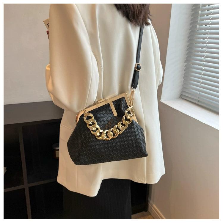 https://cdn.shopifycdn.net/s/files/1/0669/3876/5628/files/Carauana-UNIU-SILVER-GOLD-Knitted-Crossbody-Bag-Fashion-Satchel-NEW-2024-Collection-32.webp?v=1729464470