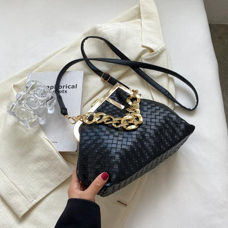 https://cdn.shopifycdn.net/s/files/1/0669/3876/5628/files/Carauana-UNIU-SILVER-GOLD-Knitted-Crossbody-Bag-Fashion-Satchel-NEW-2024-Collection-7.webp?v=1729464401