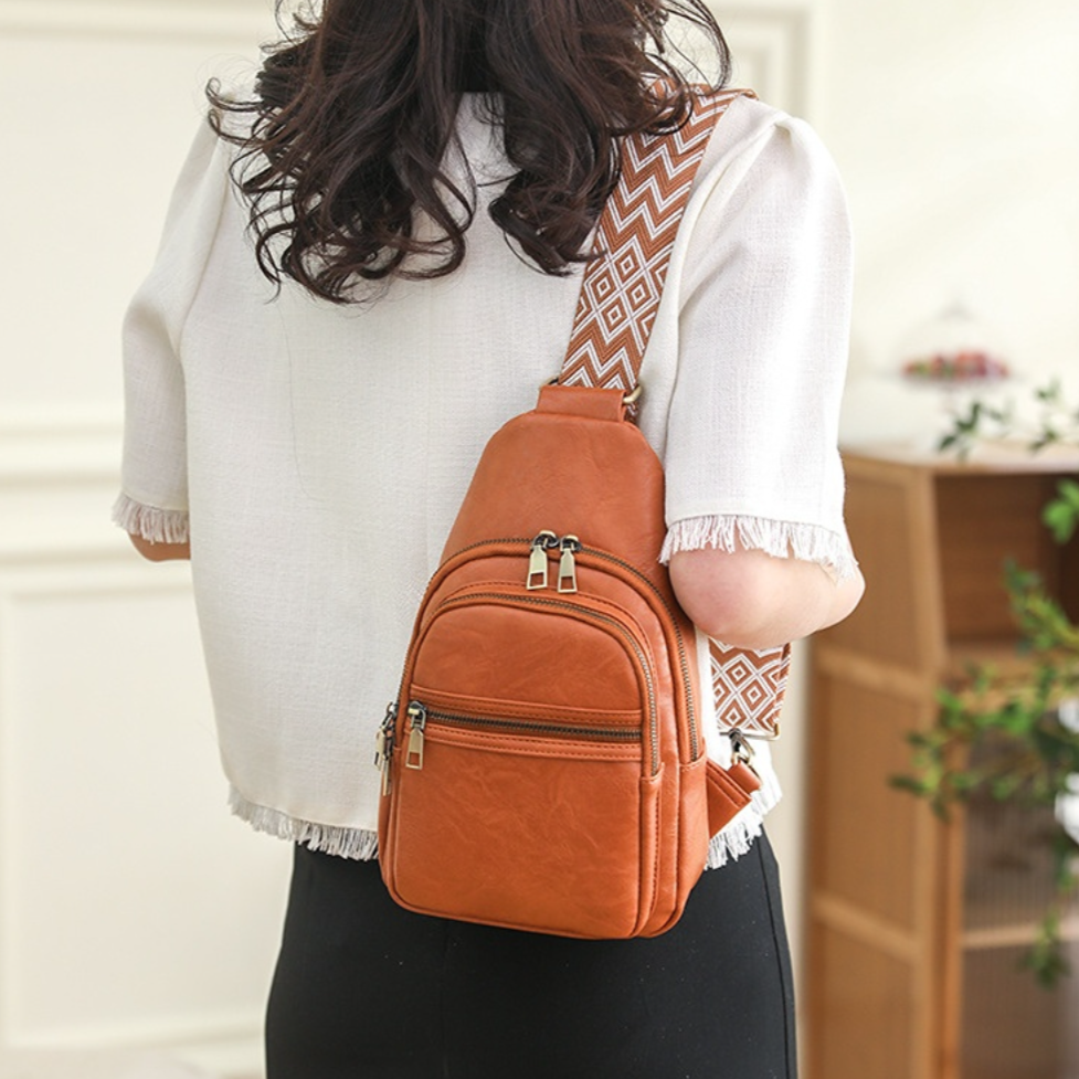 https://cdn.shopifycdn.net/s/files/1/0645/7799/5005/files/CHest-sling-bag-67.png?v=1695257337