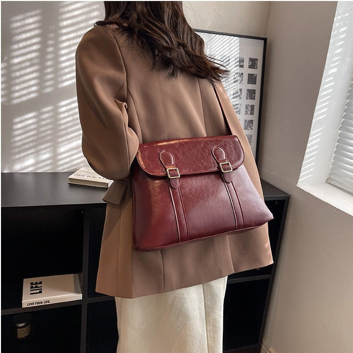 https://cdn.shopifycdn.net/s/files/1/0645/7799/5005/files/Wine-red-satchel1.jpg?v=1690254880