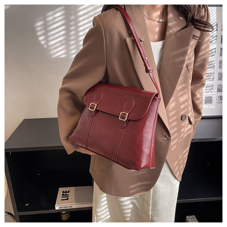 https://cdn.shopifycdn.net/s/files/1/0645/7799/5005/files/Wine-red-satchel-3.jpg?v=1690254880