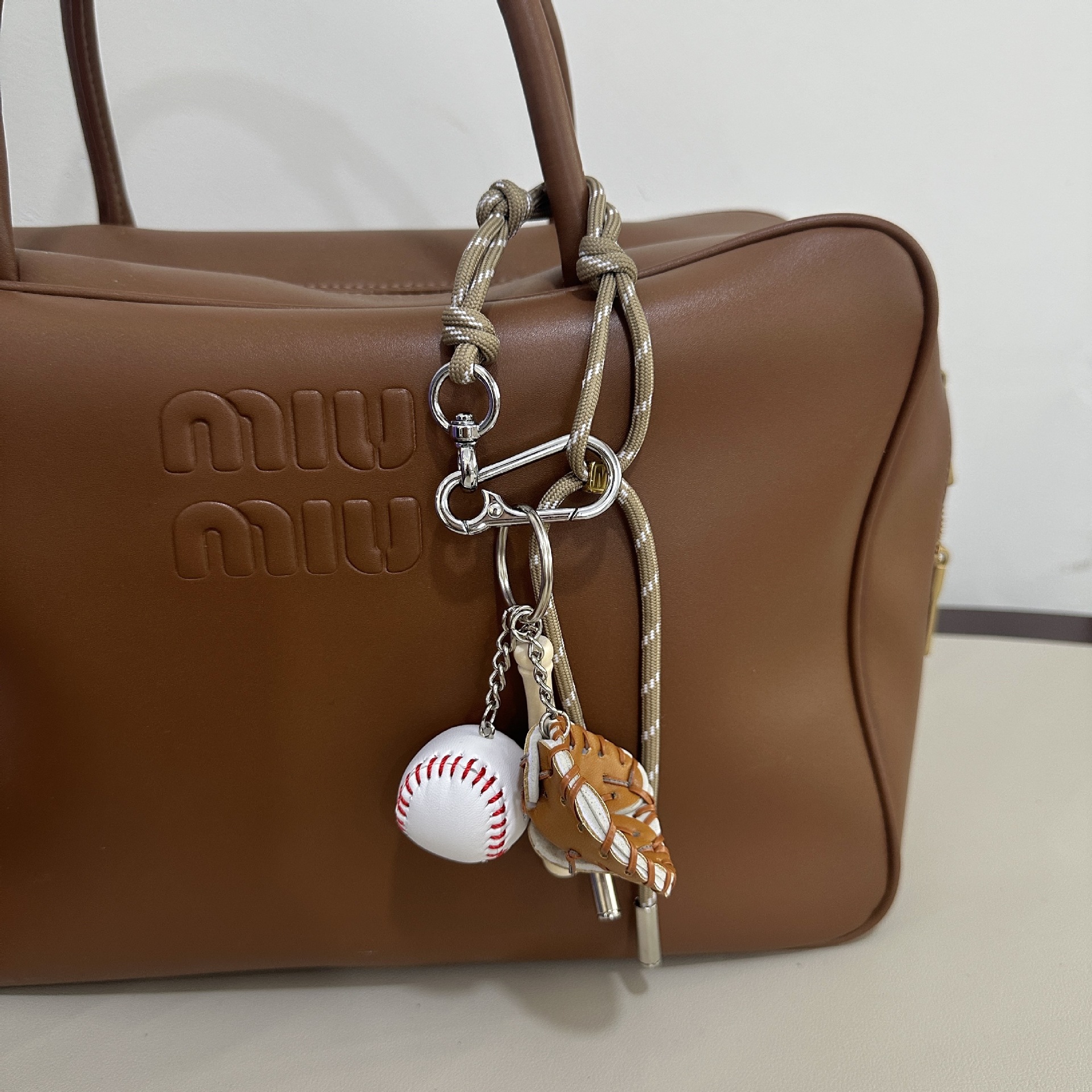 Milk tea colored M button+baseball pendant