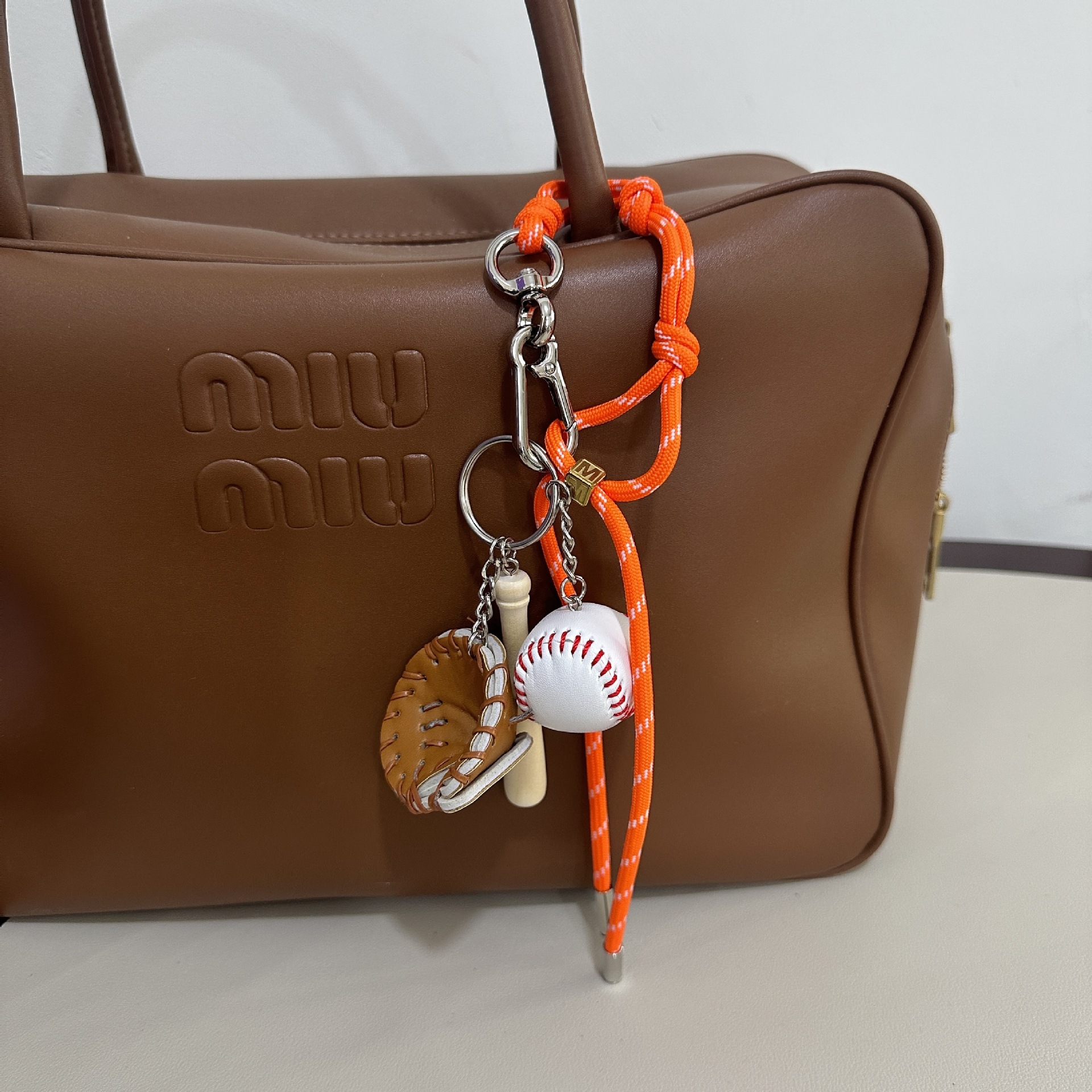 Orange M-button+baseball pendant