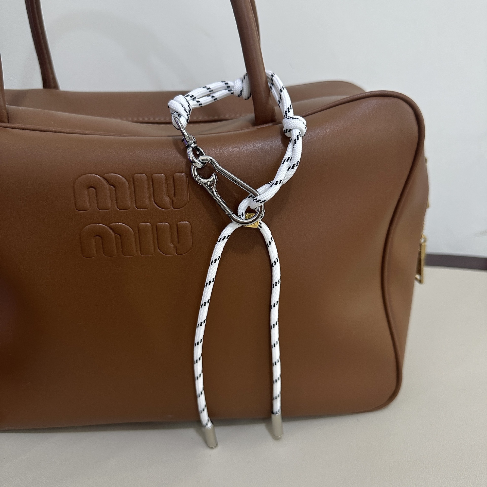 white M buckle